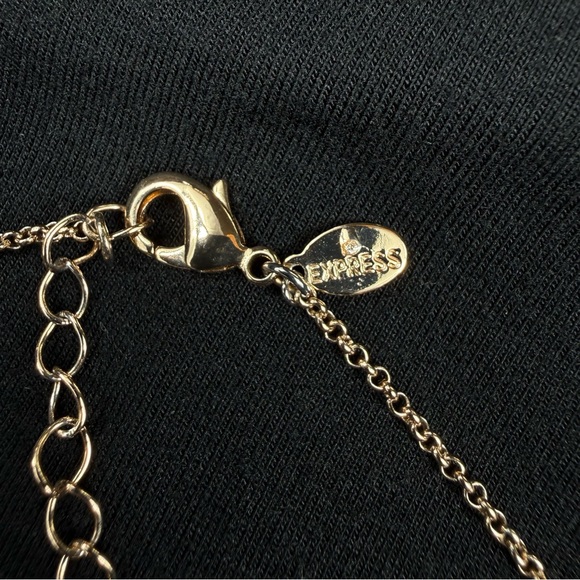 Express Gold tone Interlocking Loops necklace. - Picture 3 of 6